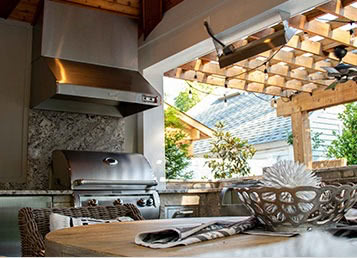 indoor BBQ with stainless steel hood ventilation